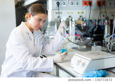Portrait of young woman lab technician working Portrait of young woman lab technician working 130772672