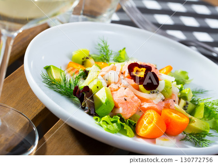 Ceviche of trout with avocado, cumquat, greens Ceviche of trout with avocado, cumquat, greens 130772756