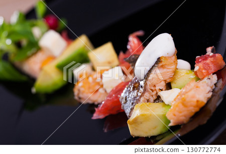 Salad with trout, vegetables, cheese 130772774