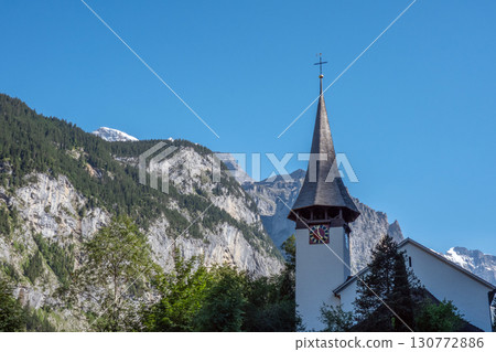 Amazing village with famous church and Staubbach waterfall in su 130772886