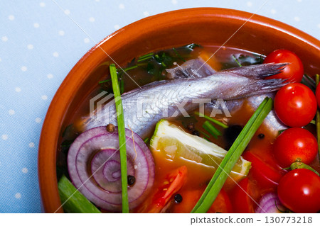 Fisherman's broth prepared with poutassou and small sea fish 130773218