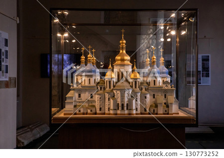 A detailed model of Saint Sophia Cathedral in Kyiv showcases its intricate design and golden domes, reflecting the rich history of this significant Orthodox landmark. 130773252