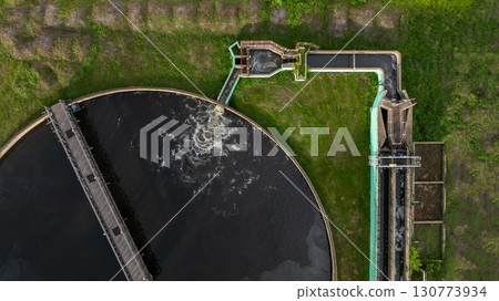 Aerial view wastewater treatment plant, Sustainable water management environment, Black water treatment tank with waste water, Circle circular water clarifier cleaning water. 130773934