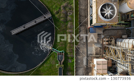 Aerial view wastewater treatment plant, Sustainable water management environment, Black water treatment tank with waste water, Circle circular water clarifier cleaning water. 130773936