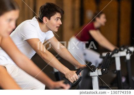 Guy in cycling training 130774359