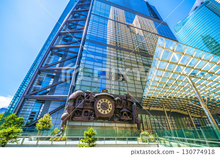 Tokyo cityscape in Japan: A view of the NTV Big Clock, a symbol of Shiodome that is popular with foreign tourists 130774918
