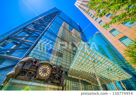 Tokyo cityscape in Japan: A view of the NTV Big Clock, a symbol of Shiodome that is popular with foreign tourists 130774954