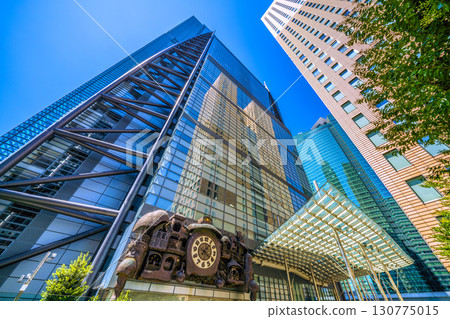 Tokyo cityscape in Japan: A view of the NTV Big Clock, a symbol of Shiodome that is popular with foreign tourists 130775015