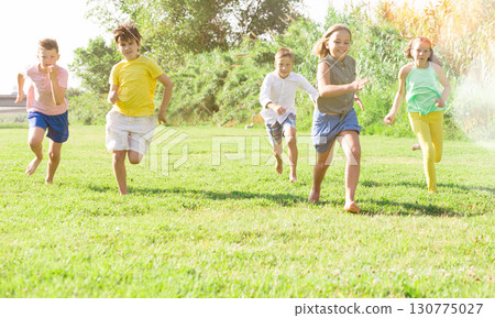 Boys and girls running Boys and girls running 130775027