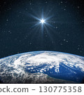 Bright star shines above the Earth in starry space. Birth of Jesus concept, Star of Bethlehem. Elements of this image furnished by NASA 130775358