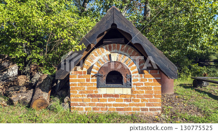 A furnace for burning shredded branches after a shredder in Slovakia. 130775525