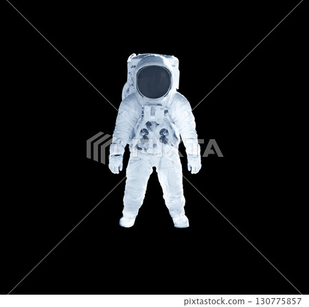 Astronaut in a spacesuit stands, black background. Hands down. Elements of this image courtesy of NASA. 130775857