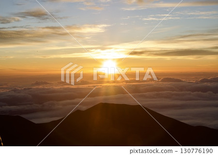 A powerful sunrise over the Big Island of Hawaii A powerful sunrise over the Big Island of Hawaii 130776190