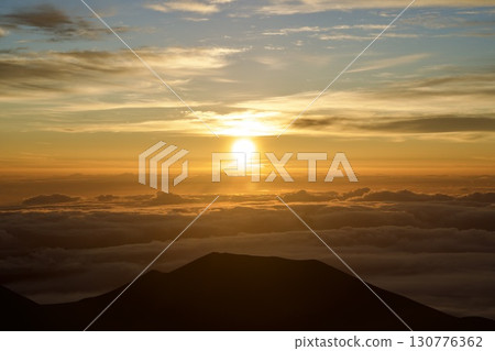 Sea of clouds and sunrise on the Big Island of Hawaii Sea of clouds and sunrise on the Big Island of Hawaii 130776362