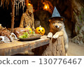 Eat, drink, and be scary! Adorable wolf cub wizard celebrates Halloween party with festive pumpkins and a skeleton. 130776467