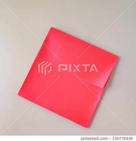 Red paper envelope on a color background. Red paper envelope on a color background. 130776836