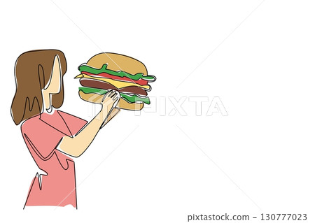 Single one line drawing a woman eating a large burger. Will be full when eating in large portions. Hobby eating. The greedy woman. National No Diet Day. Continuous line design graphic illustration 130777023