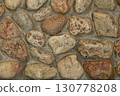 Abstract macro shots of tiny stones on wall 130778208