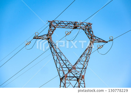 Electricity pylon and nature, real life photo 130778229