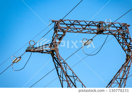 Electricity pylon and nature, real life photo 130778231