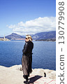 mature woman working outside in caffe on beach coast, lifestyle people concept 130779908