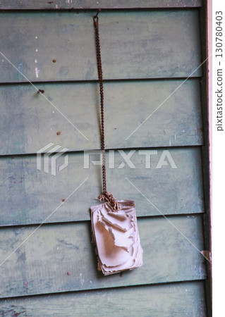 Old notebook hanging on weathered wall at Hsiang Kuang Village Taiwan. Old notebook hanging on weathered wall at Hsiang Kuang Village Taiwan. 130780403