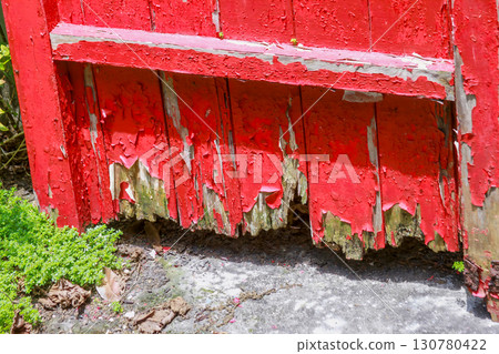 Peeling Red Door Base at Xian Guang Military Kindred Village Cultural Park. Peeling Red Door Base at Xian Guang Military Kindred Village Cultural Park. 130780422