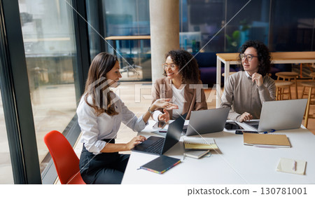 A Collaborative Meeting Taking Place in a Modern Workspace with Professionals in Attendance A Collaborative Meeting Taking Place in a Modern Workspace with Professionals in Attendance 130781001