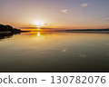 Spectacular sunset over lake Balaton with golden reflections, Hungary. 130782076