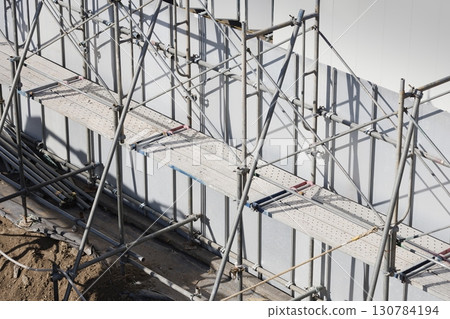 Under construction, inside the temporary fence 130784194