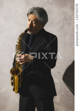 man blowing sax man blowing sax 130784376