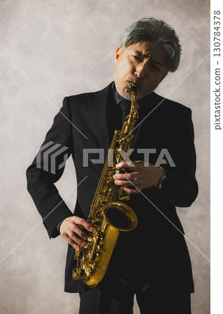 man blowing sax man blowing sax 130784378