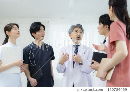 Male doctor and nurse in scrubs 130784469