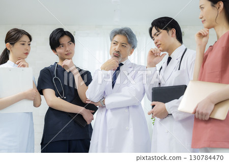 Male doctor and nurse in scrubs 130784470