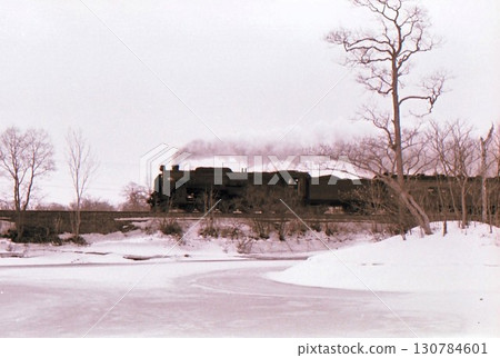 1970: Snow-covered C622-hauled express train Niseko, Onuma Koen Station, Hakodate Main Line, Hokkaido, archival photograph 1970: Snow-covered C622-hauled express train Niseko, Onuma Koen Station, Hakodate Main Line, Hokkaido, archival photograph 130784601