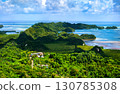 Stunning high angle view of the lush landscape of Airai, the main island of Palau, and the surrounding Pacific Ocean on a beautiful sunny day. Micronesia, Oceania 130785308