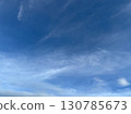 Blue sky with scattered white clouds in natural daylight 130785673