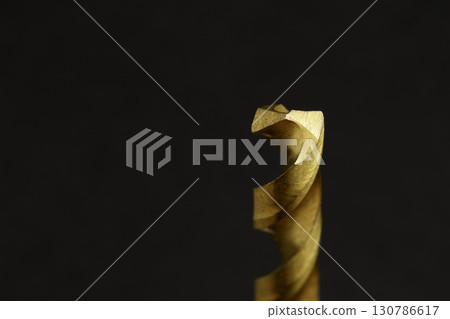 Drill bit on a black background Drill bit on a black background 130786617