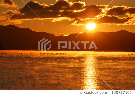 Winter Setouchi sunrise and Sun Road with a storm of hair 130787105