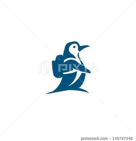 Stylized blue and white illustration of a penguin standing on a rock with grass against a white background 130787348