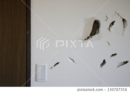 Holed wall and cross Holed wall and cross 130787358