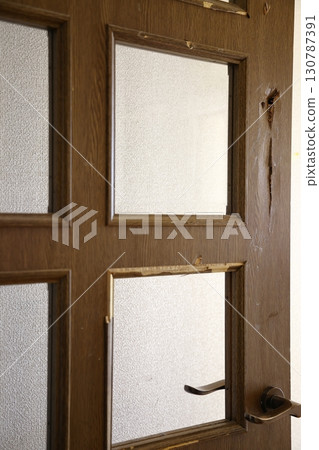 A door with a deliberate hole in it 130787391