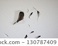 A wall with a deliberate hole in it 130787409