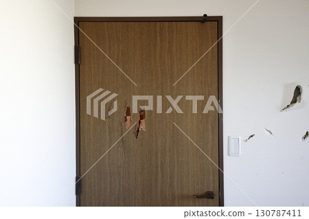 Door and wall with holes Door and wall with holes 130787411