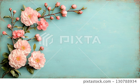 Soft Pink Flowers on Light Blue Background with Branches and Buds in Delicate Design 130788934