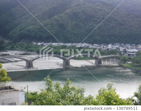 View of Kintai Bridge and Iwakuni cityscape from a high vantage point View of Kintai Bridge and Iwakuni cityscape from a high vantage point 130789511