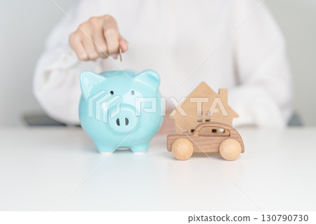 Piggy bank with car and Home model. Car loan, Interest rate, real estate, house, Insurance, Financial, Repair, Tax, mortgage and Maintenance 130790730