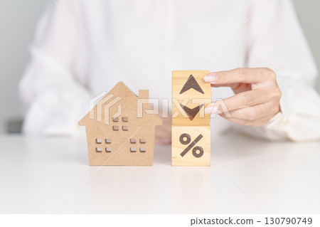 Percentage block change to UP and Down arrow with Home model. Real estate Mortgage, Refinance, House loan and debt, Interest rate, Insurance, Financial Property and economic recession Percentage block change to UP and Down arrow with Home model. Real estate Mortgage, Refinance, House loan and debt, Interest rate, Insurance, Financial Property and economic recession 130790749