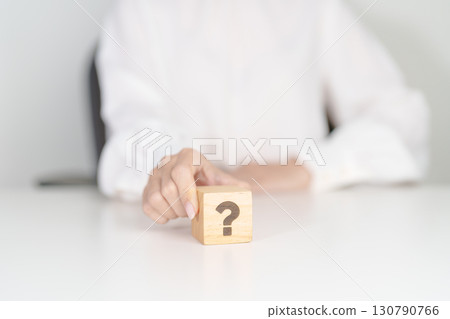 Wood block of Questions Mark sign. FAQ, frequency asked questions, Answer, Q and A, Information, Communication, problem and interrogation Concepts Wood block of Questions Mark sign. FAQ, frequency asked questions, Answer, Q and A, Information, Communication, problem and interrogation Concepts 130790766