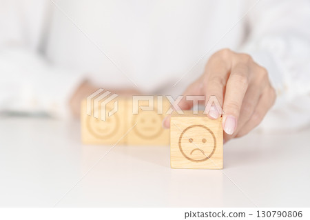 Woman show Unhappy Sad face block, Mental health Assessment, Psychology, Health Wellness, Feedback, Customer Review, Experience, Satisfaction Survey, Negative Thinking and World Mental Health day 130790806